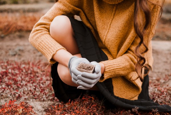 woman landscaping for winter prep in Ventura County
